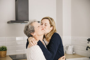 daughter-kissing-mom-mothers-day_23-2147791426